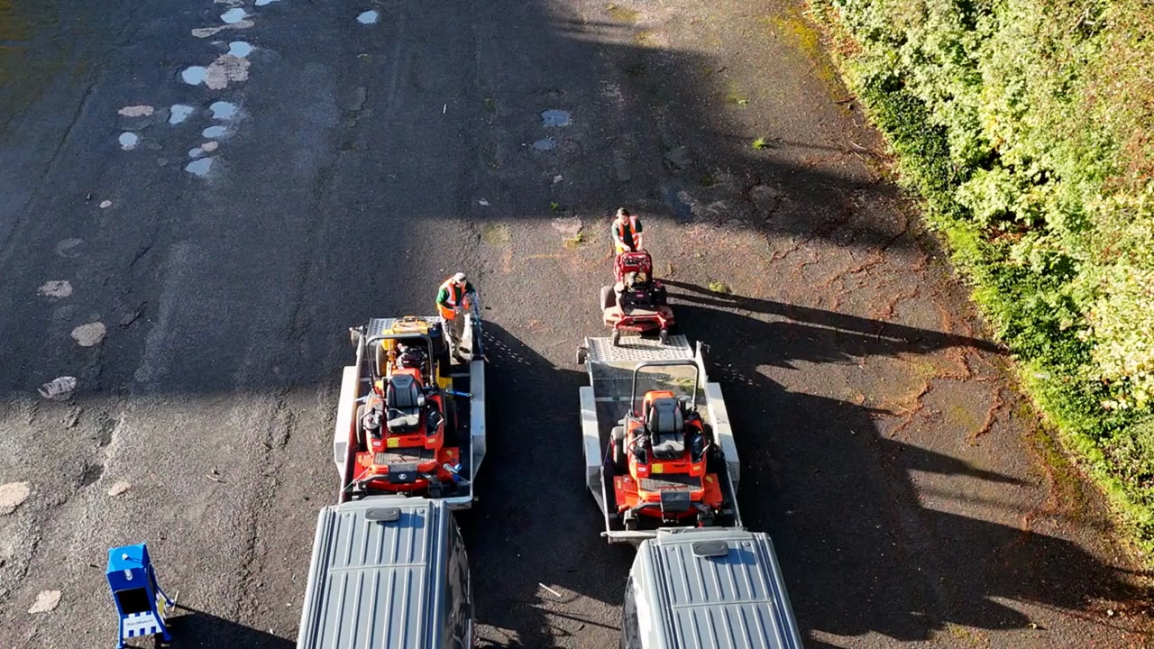 Landywood crew, vehicles and equipment on an education site