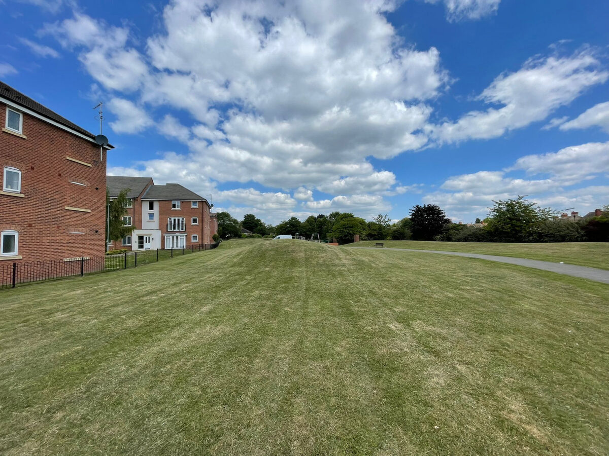 Striped lawns maintained at a residential development